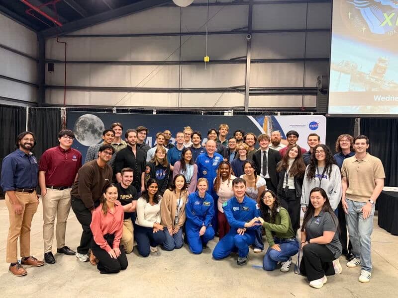 Marshall interns gathered with Crew-11 astronauts for a group photograph