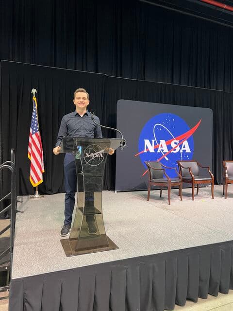 Standing at a NASA podium