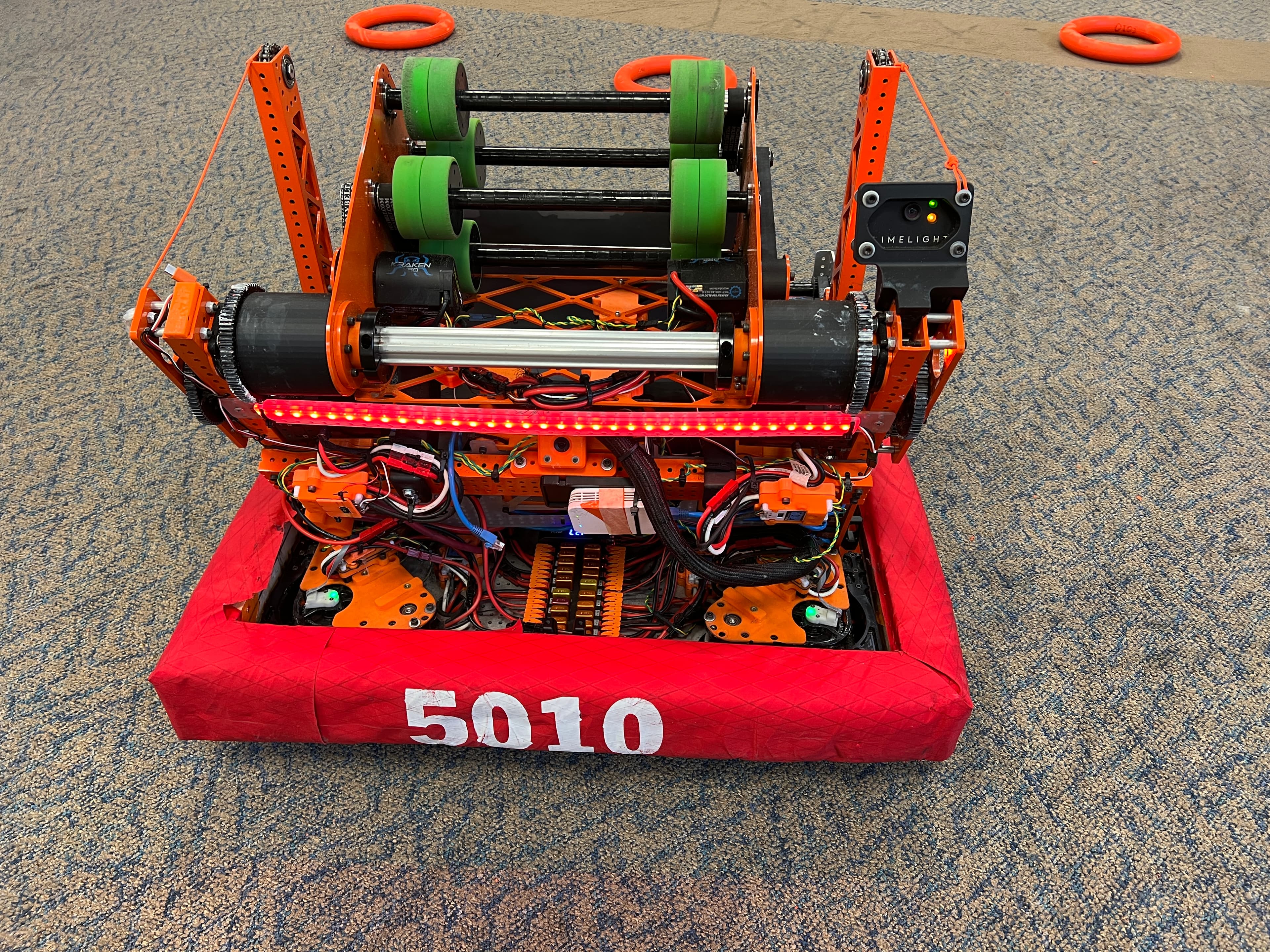 Orange Team 5010 Spitfire competition robot with rollers, motors, and control electronics